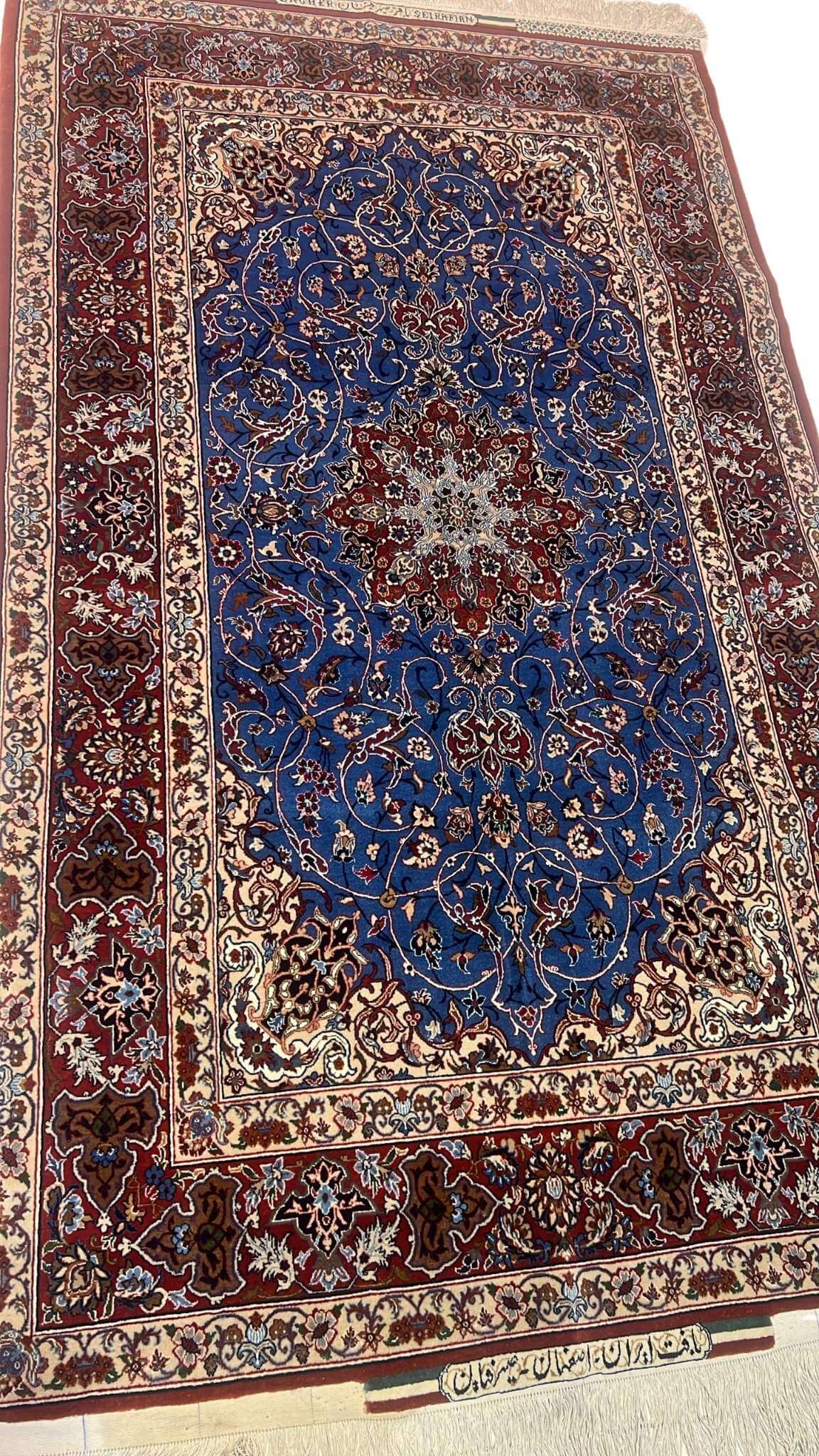 Detailed Pattern: Intricate floral and medallion motifs in natural wool and silk blend with vibrant natural dyes.